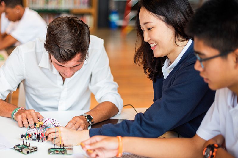 Pupils working on electronics in a D&T project
