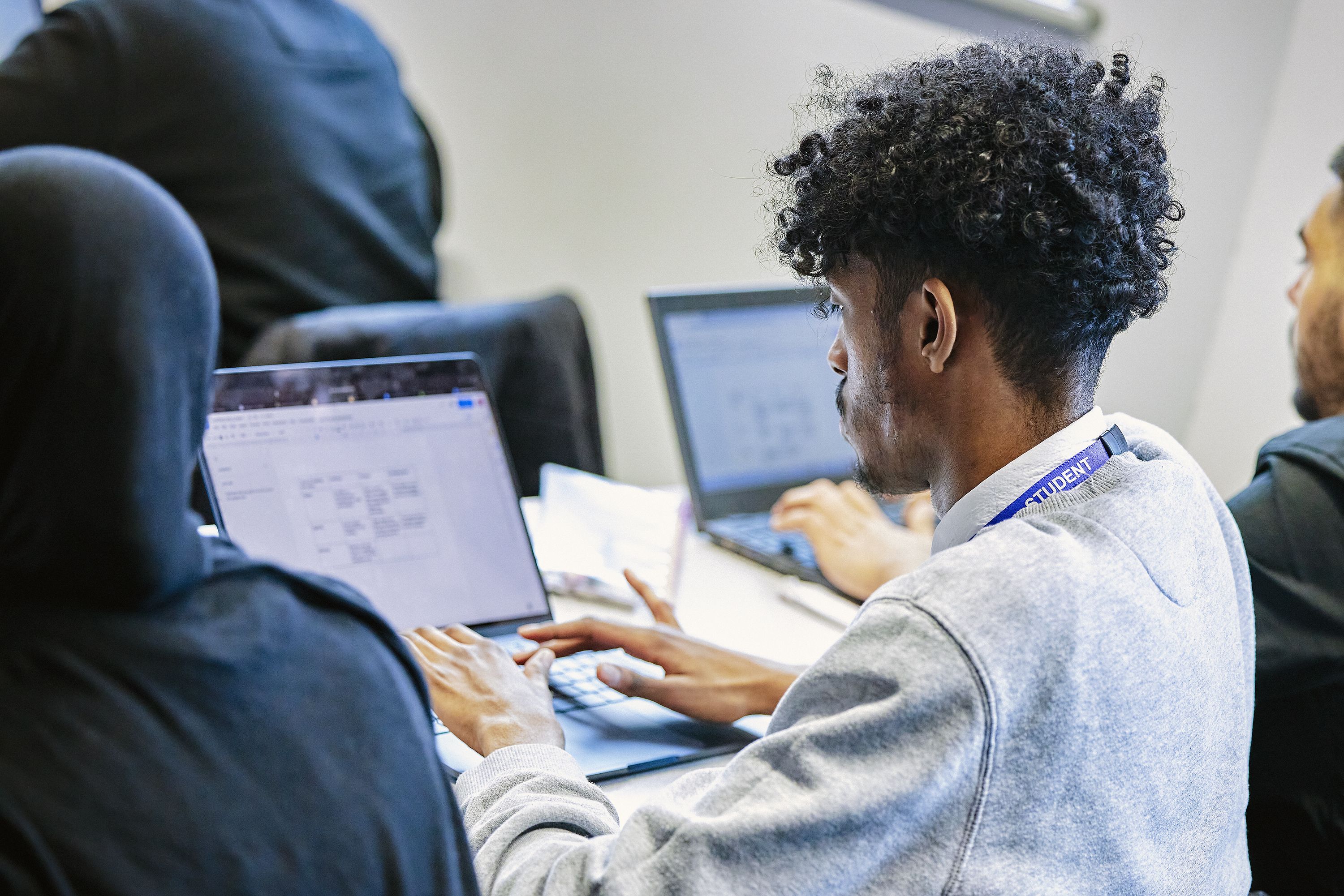 Pupil working independently on a laptop